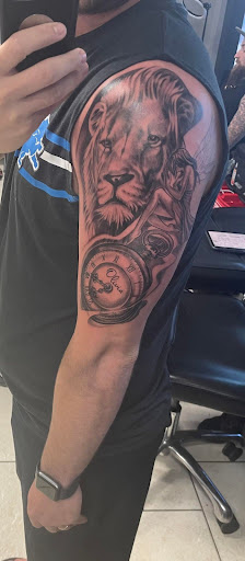 Find cool armband tattoo ideas for your next unique tattoo in Ocoee at Slaughterized Ink Tattoo and Piercing Studio