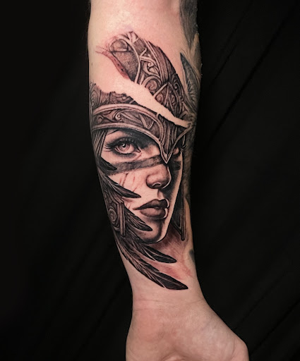 Explore dog paw tattoo ideas, creative tattoo ideas in Barre, available at Rock City Tattoo