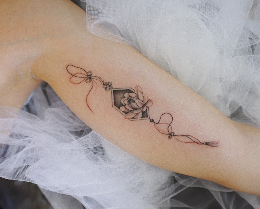 Explore c section tattoo ideas, creative tattoo ideas in Orange, available at Baron Art Tattoo