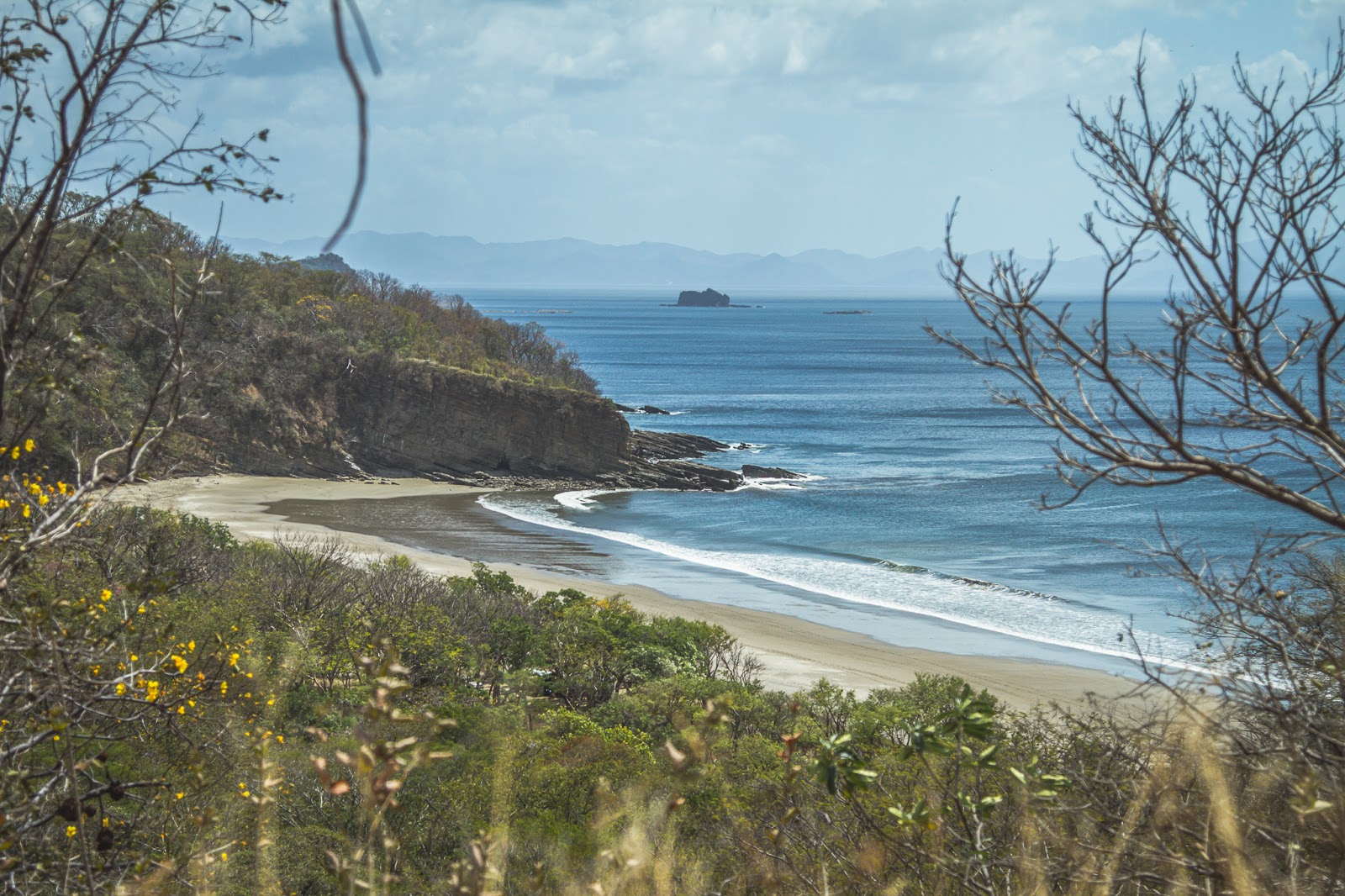 Fotografija Plaža Escameca in naselje