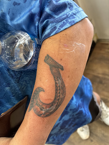 Explore mens behind the ear tattoo ideas, creative tattoo ideas in Honolulu, available at Aloha Tattoo Waikiki Hilton Hawaiian Village Rainbow Bazaar