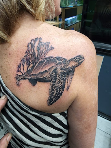 Explore whole back tattoo ideas, creative tattoo ideas in Foley, available at Symbolic Ink Tattoo Studio