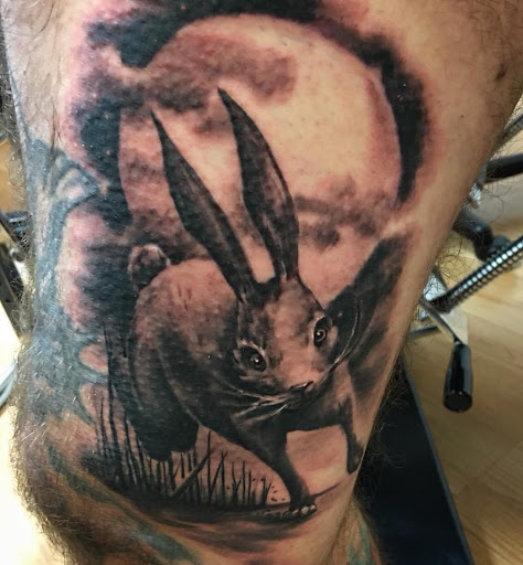 Explore boxing gloves tattoo ideas, creative tattoo ideas in Flatwoods, available at Forrest Tattoo Company