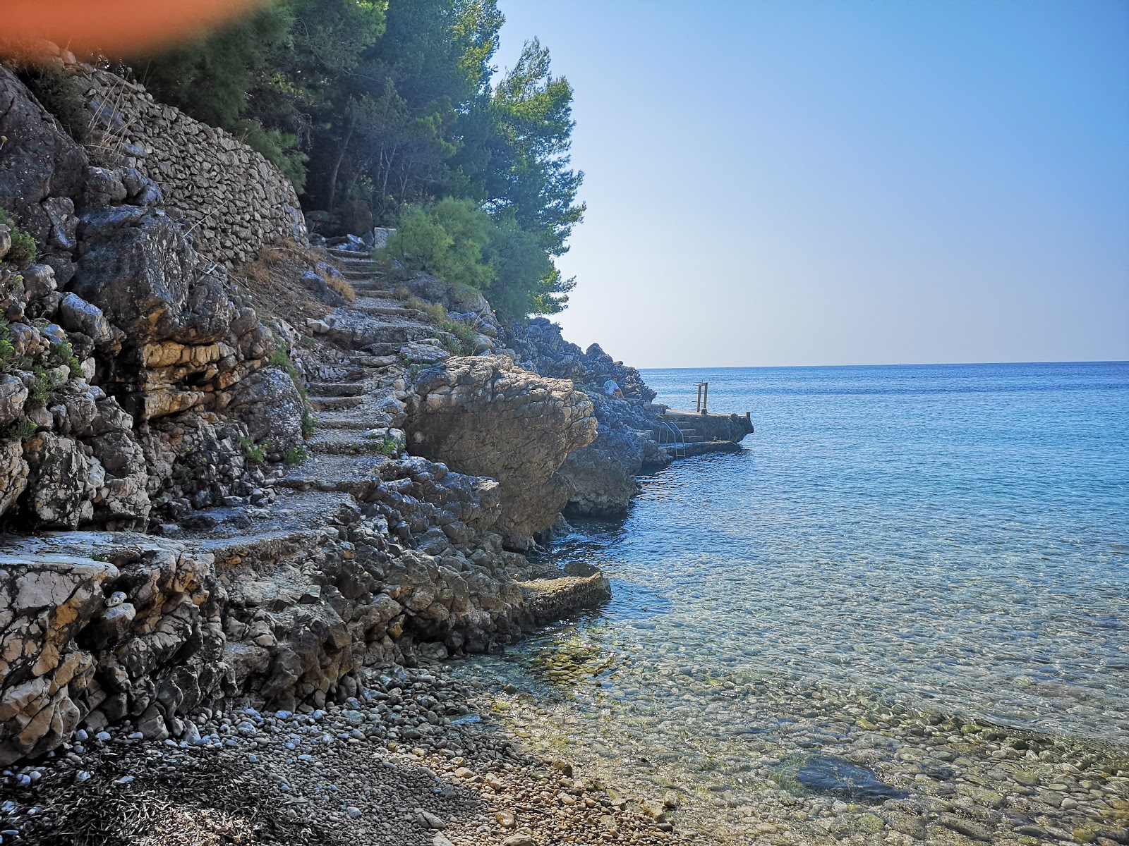 Fotografija Kavala beach z modra čista voda površino