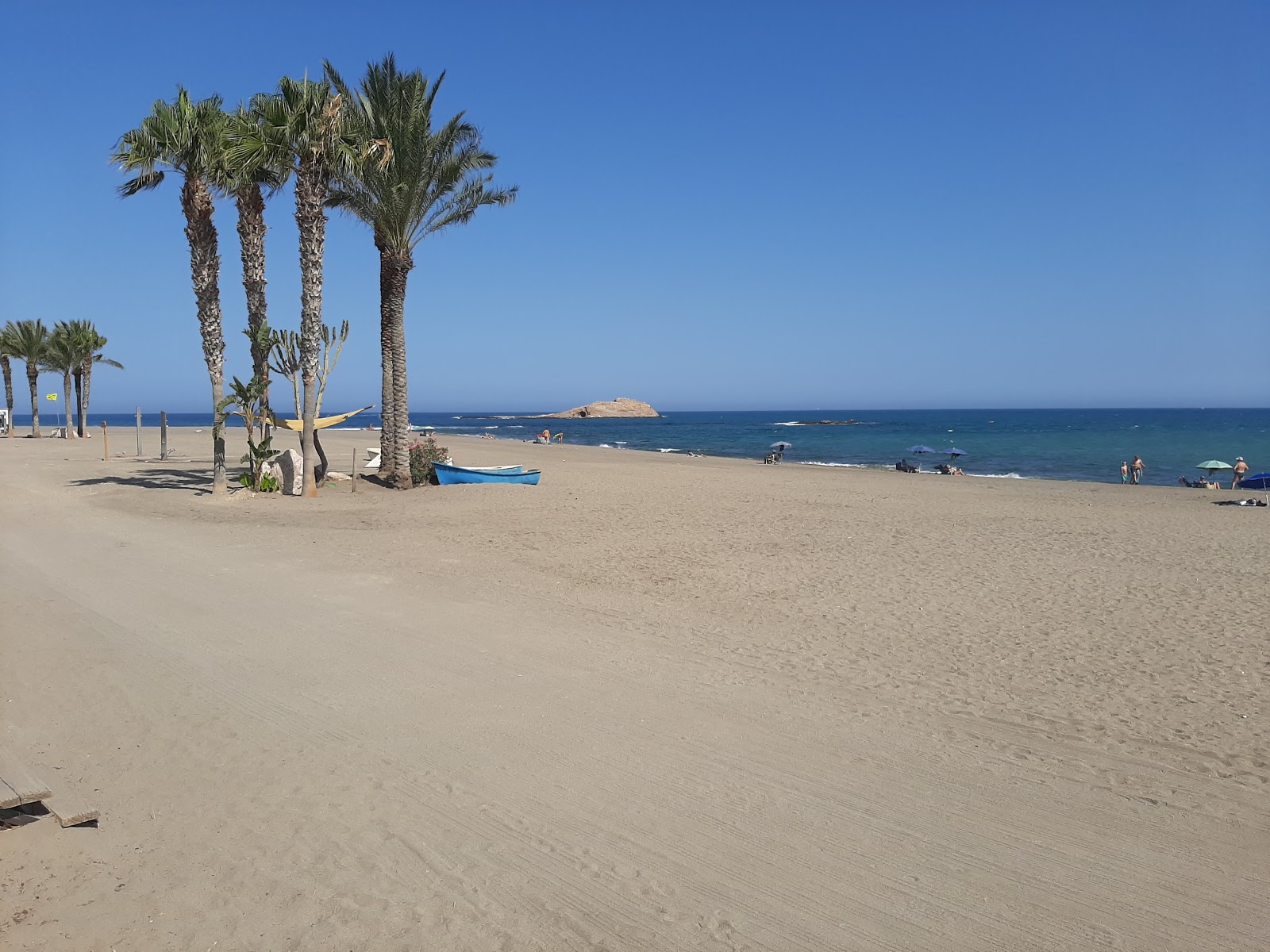 Photo de Playa de Los Cocones avec rivage droit, long