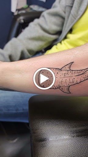 Explore haunted mansion tattoo ideas, creative tattoo ideas in Williamston, available at Inkd Tattoo Parlor