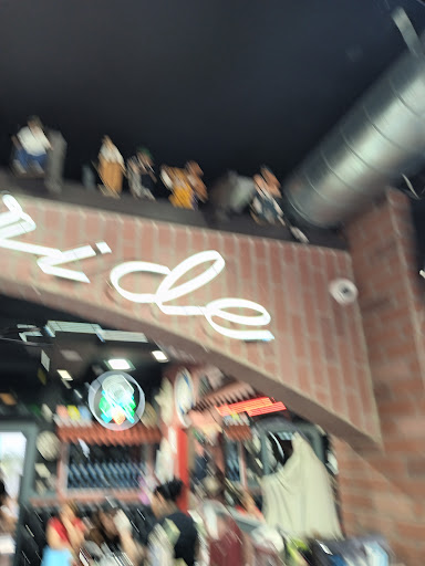 Explore ring tattoo ideas for him, creative tattoo ideas in Los Angeles, available at Brown Pride Tattoos