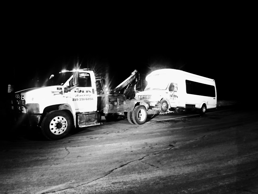 Tk Company Towing, Low Rates!