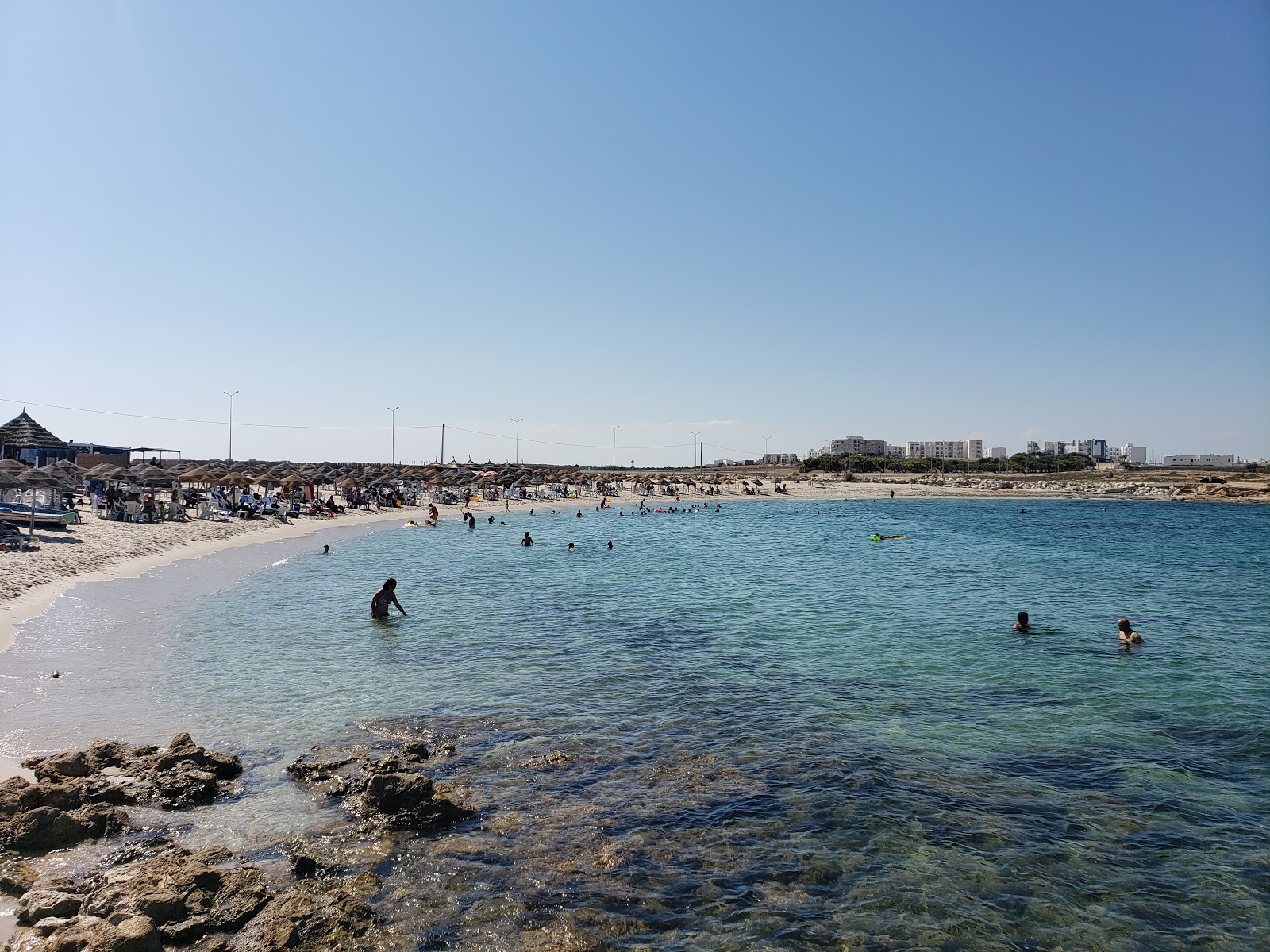 Foto di Hergla Beach con una superficie del sabbia fine e luminosa