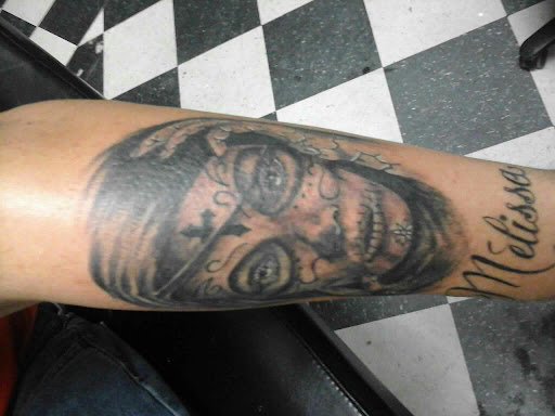 Tattoo Shop «Tan the Man Tattoo & Body», reviews and photos, 6871 S Gessner Rd, Houston, TX 77036, USA