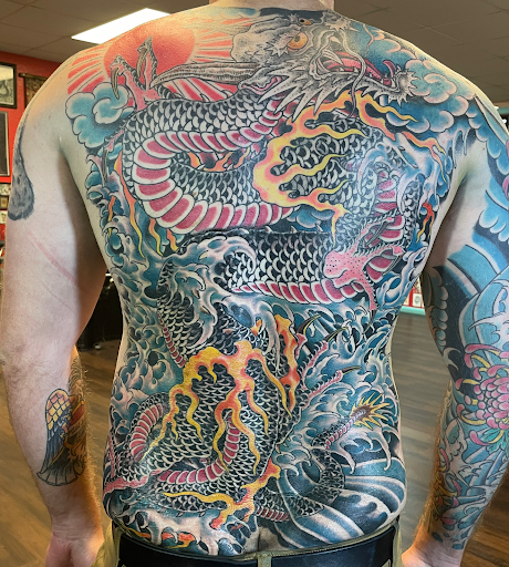 Explore tattoo ideas for women leg, creative tattoo ideas in Georgetown, available at Iron Rite Tattoo South