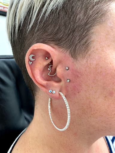 Explore forearm wolf tattoo ideas, creative tattoo ideas in Myrtle Beach, available at Professional Body Piercing by Jackie