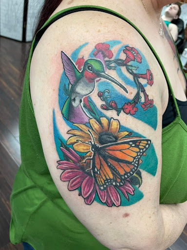 Explore patriotic tattoo sleeve ideas, creative tattoo ideas in Dubuque, available at The Crows Nest
