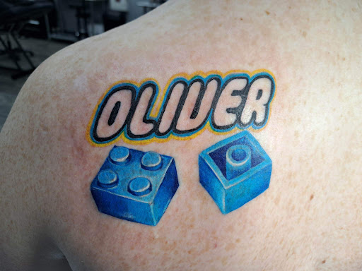 Explore family leg tattoo ideas, creative tattoo ideas in El Paso, available at American Tattoo Society of Ft Bliss