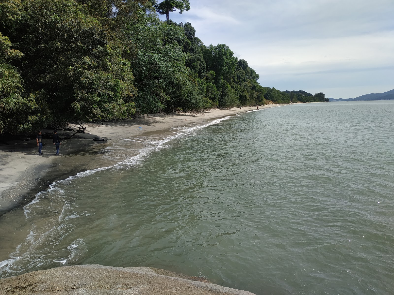 Φωτογραφία του Janggus Damai Laut Beach με φωτεινή άμμος επιφάνεια