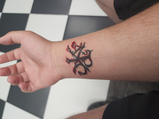 Explore simple one piece tattoo ideas, creative tattoo ideas in Las Vegas, available at Inky Dragon Tattoo Club