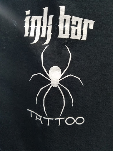 Explore small forearm tattoo ideas for men, creative tattoo ideas in North Aurora, available at Ink Bar Tattoo