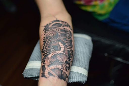 Explore space filler tattoo ideas, creative tattoo ideas in West Palm Beach, available at GURU Tattoo & Piercing - Palm Beach County