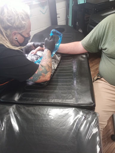 Explore gamble tattoo ideas, creative tattoo ideas in Cincinnati, available at UniquInk Tattoos & Piercings