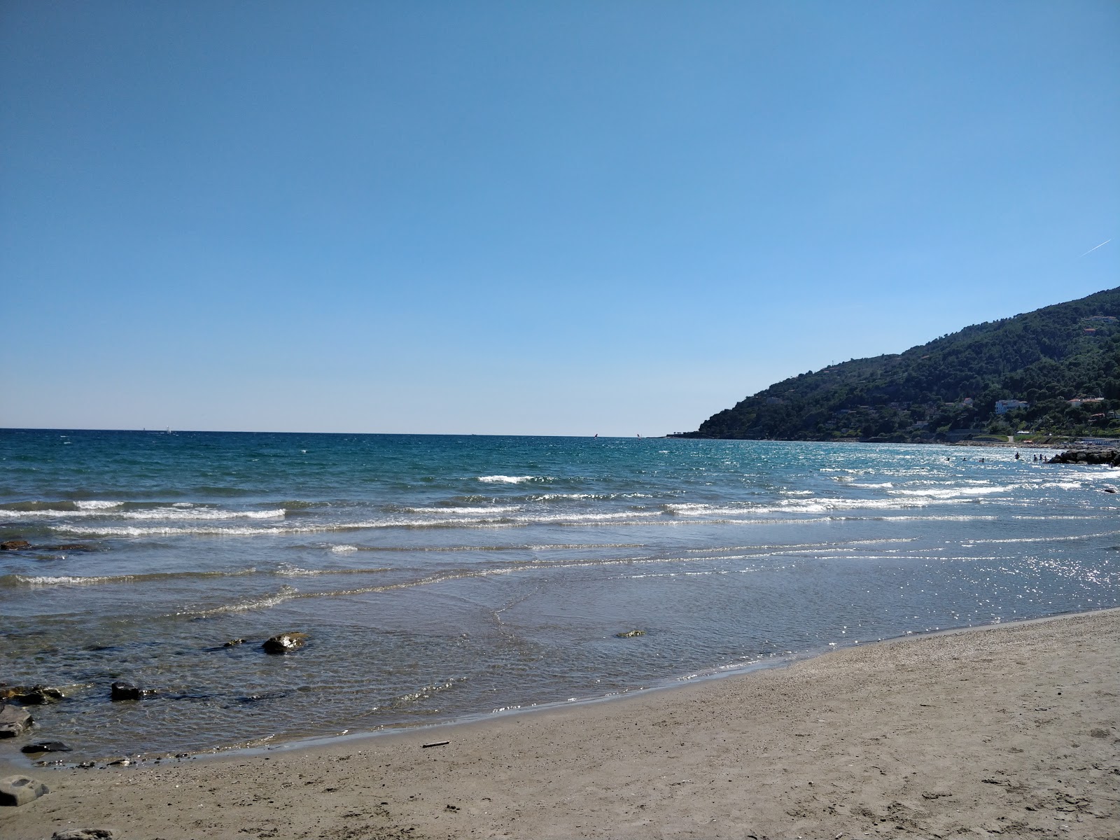 Photo of Andora beach II backed by cliffs