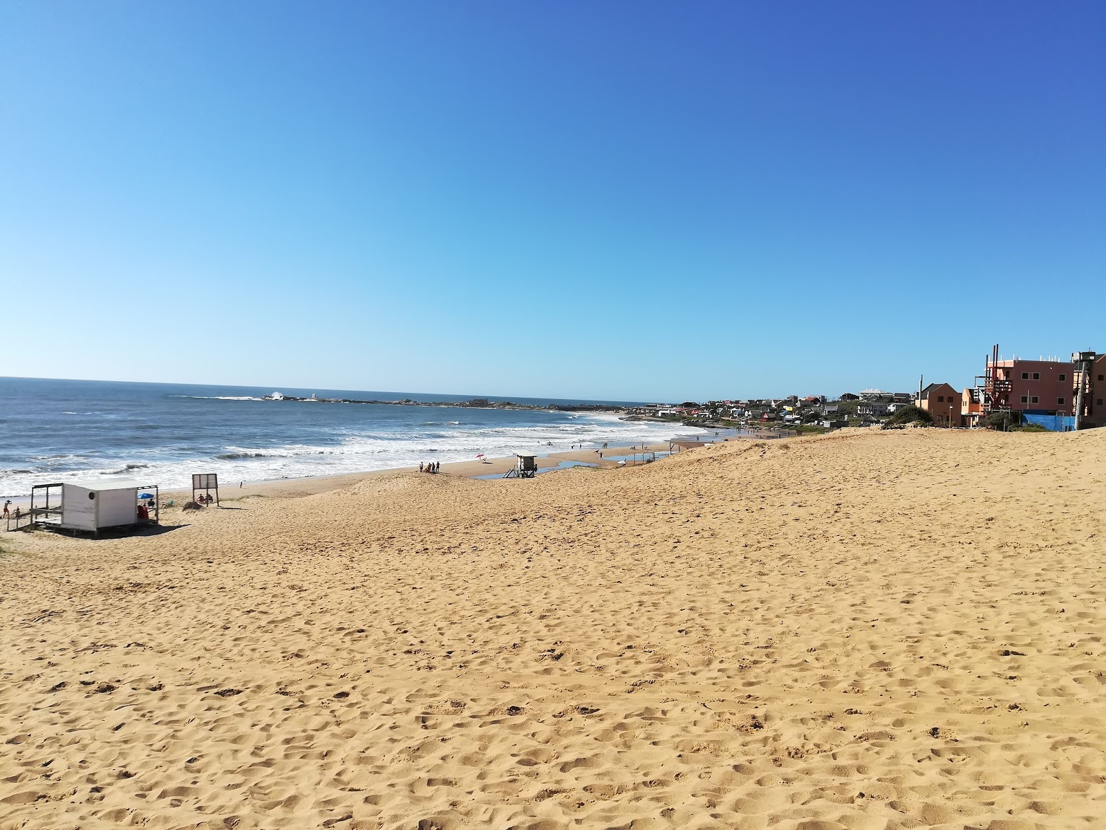 Foto av Del Rivero Beach med beige sand yta