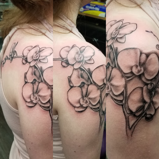 Explore foot tattoo ideas for female, creative tattoo ideas in East Windsor, available at AAA Tattoo