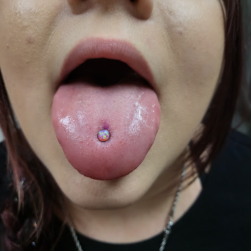 Explore red tattoo ideas women, creative tattoo ideas in Memphis, available at Rose Quartz Body Adornment LLC