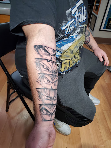 Explore forearm christian tattoo ideas, creative tattoo ideas in Ann Arbor, available at Spiral Tattoo