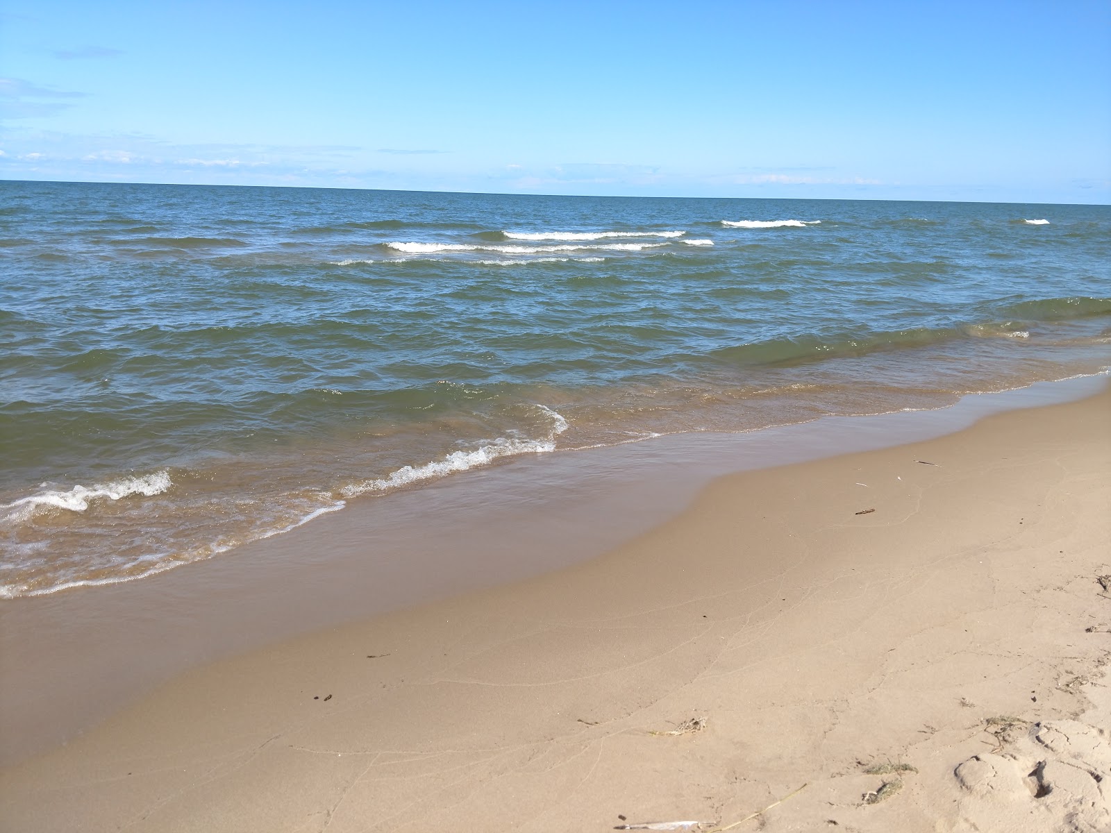 Valokuva Oak Beach County Park Beachista. - suosittu paikka rentoutumisen tuntijoille