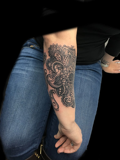 Explore tiny hummingbird tattoo ideas, creative tattoo ideas in Dunn, available at Yankee Tattoo and Piercing