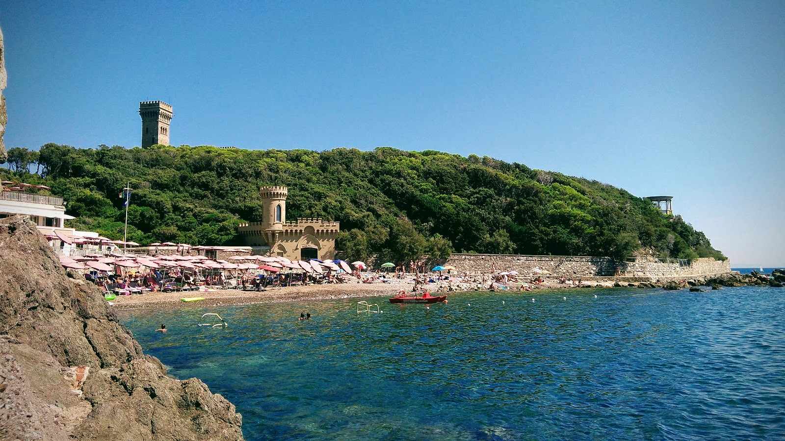 Foto von Spiaggia Del Rogiolo mit felsiges gelände Oberfläche