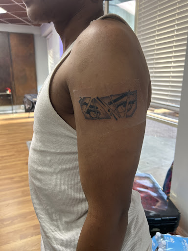 Explore male ankle tattoo ideas, creative tattoo ideas in Arlington, available at Urbans Tattoo & Piercing Studio