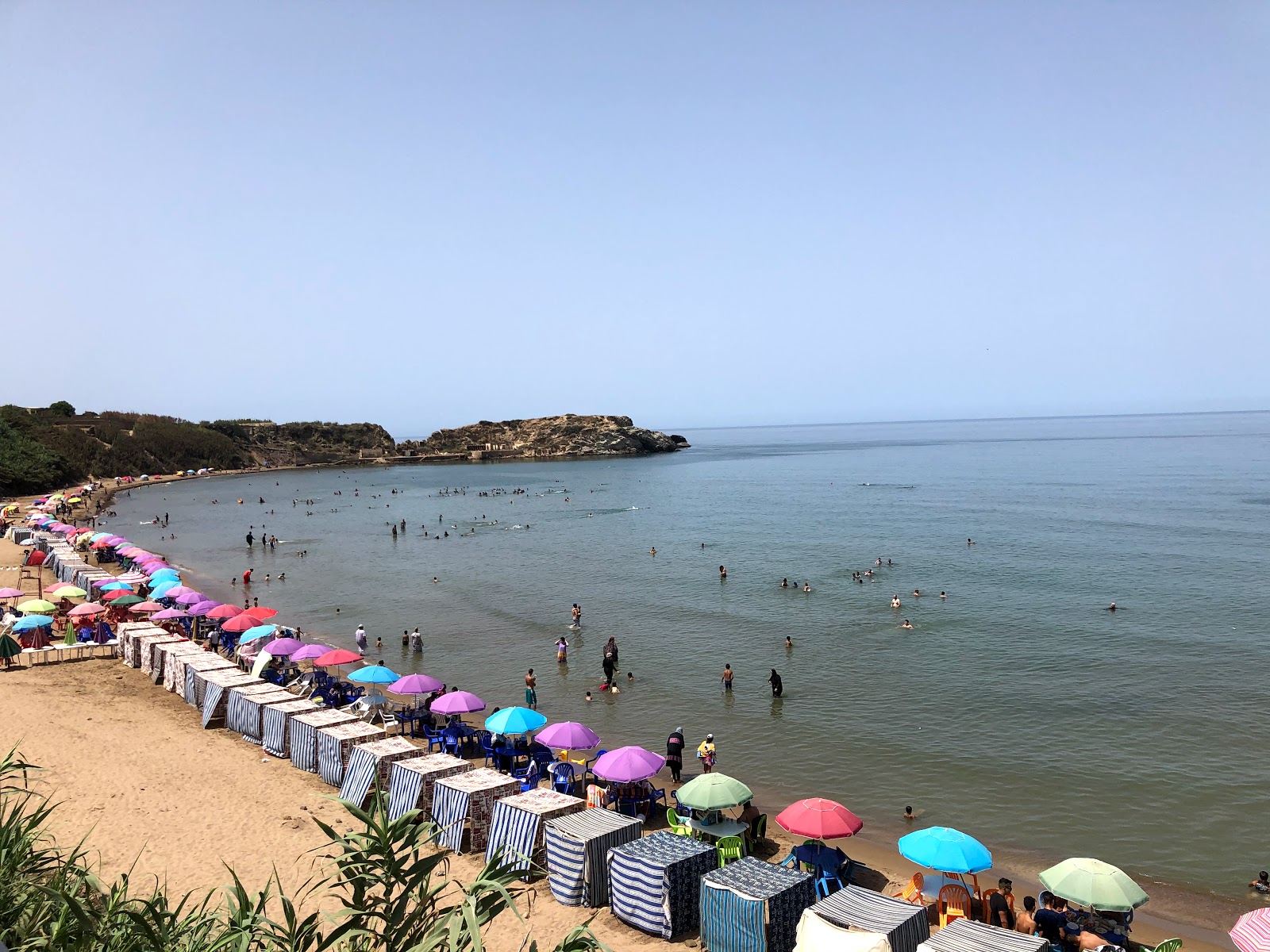 Fotografija Plage Tizirine z rjavi pesek površino