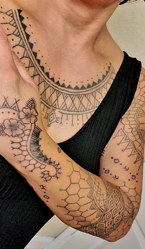 Explore guitar pick tattoo ideas, creative tattoo ideas in Lake Mary, available at Balinese Tattoo USA