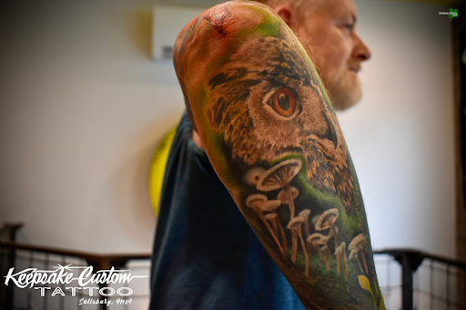 Find music tattoo ideas for men for your next unique tattoo in Salisbury at Keepsake Custom Tattoo & Body Piercing Laser Tattoo Removal