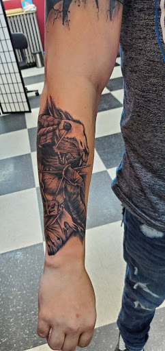 Explore thigh tattoo ideas for men, creative tattoo ideas in Du Bois, available at Primitive Addiction Tattoo Studio