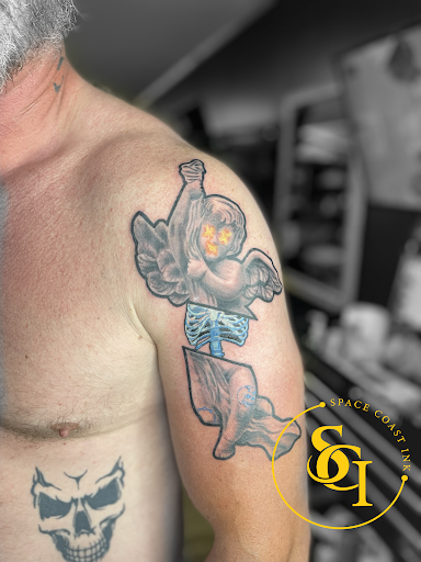 Explore aquarius tattoo ideas for men, creative tattoo ideas in Titusville, available at Space Coast Ink Tattoo Studio