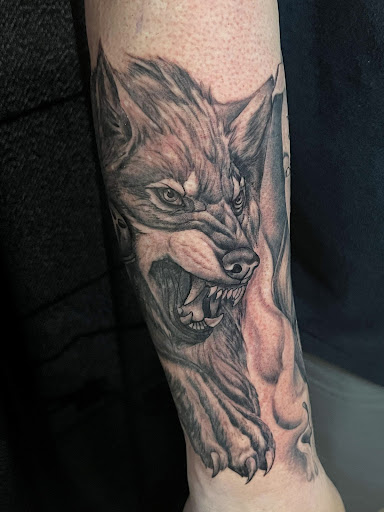 Explore bracelet tattoo ideas with names, creative tattoo ideas in Port Orange, available at Electric Shark Tattoo Studio