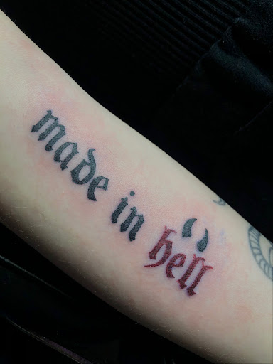 Explore globe tattoo ideas, creative tattoo ideas in North Tonawanda, available at Dark Side Ink Tattoo Studio