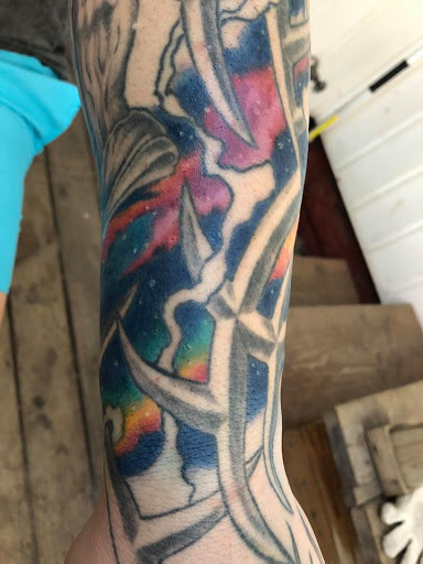 Tattoo Shop «Area 51 Tattoo & Piercing LLC», reviews and photos, 175 W Clay Ave, Muskegon, MI 49440, USA