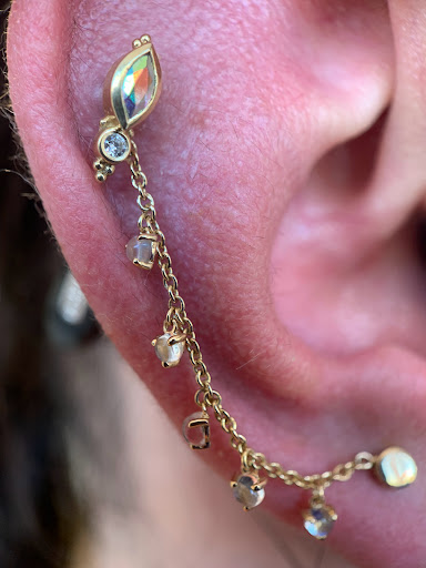 Explore tattoo ideas behind the ear, creative tattoo ideas in Sioux Falls, available at Kind Find Jewelry & Piercing