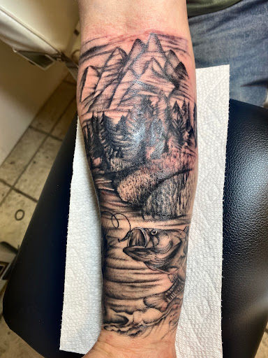 Find tattoo ideas western for your next unique tattoo in Moundsville at Cherry Haze Tattoo