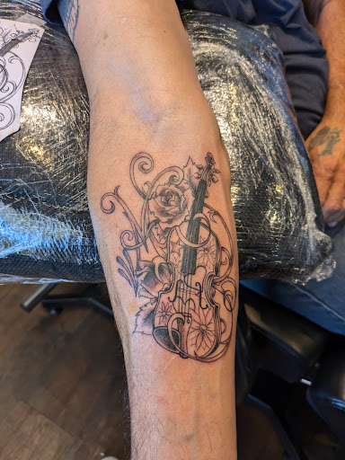 Explore thyroid cancer tattoo ideas, creative tattoo ideas in Arlington Heights, available at Studio M Tattoos