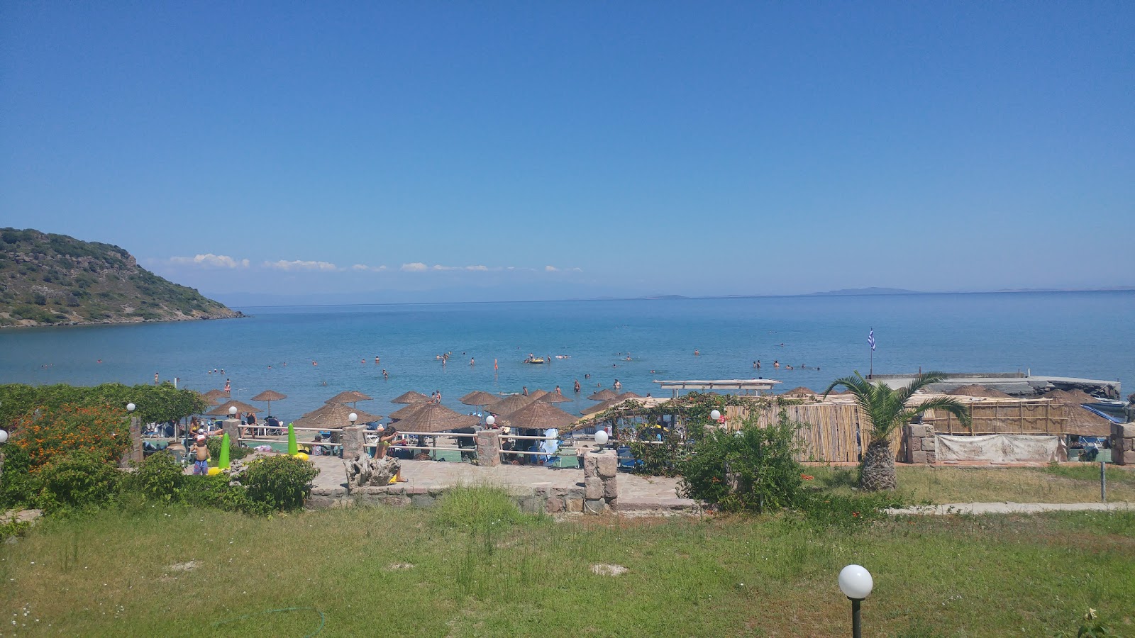 Xampelia Plajı'in fotoğrafı turkuaz saf su yüzey ile