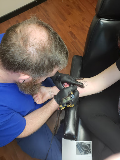 Explore loyalty tattoo ideas, creative tattoo ideas in Monticello, available at Its Just A Flesh Wound