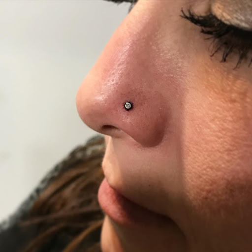 Explore faith tattoo ideas for females, creative tattoo ideas in Louisburg, available at Purple Dot Piercings