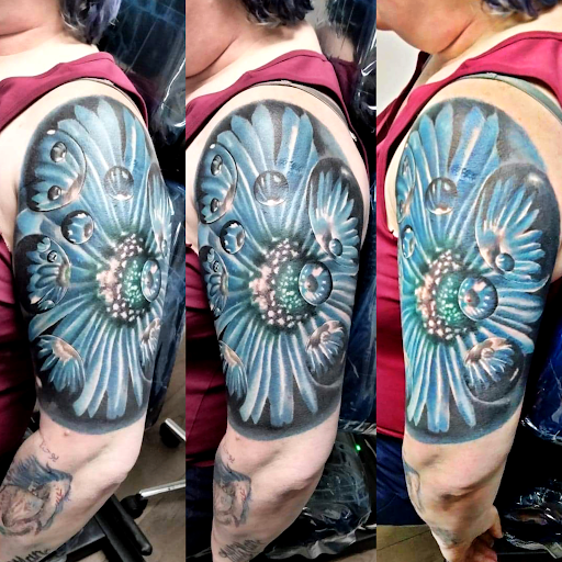 Explore michigan football tattoo ideas, creative tattoo ideas in Springfield, available at Red Tip Tattoos