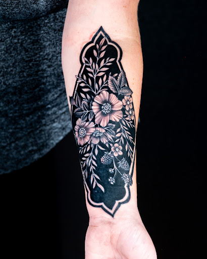 Explore dirtbike tattoo idea, creative tattoo ideas in Vancouver, available at Hopeless Tattoo & Piercing