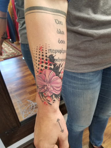 Find spinal cord tattoos ideas for your next unique tattoo in Des Moines at Skin Kitchen Tattoo
