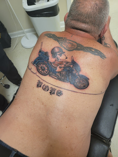 Explore october tattoo ideas for guys, creative tattoo ideas in Ozark, available at Tooth & Nail Tattoo & Piercing